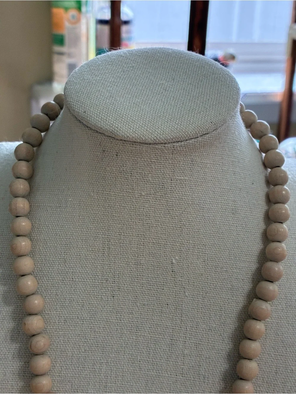The item in the image is a vintage beaded statement necklace.